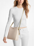 NWT-Michael-Kors-Large-Jet-Set-Signature-Logo-Messenger-Bag-Light-GoldVanilla-235994712737